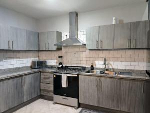 Η κουζίνα ή μικρή κουζίνα στο Casa en Villas Universidad Confort +10 φωτογραφίες