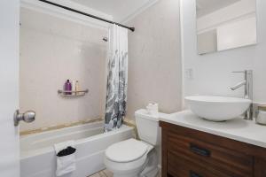 a bathroom with a sink and a toilet and a shower at Cozy 2-Bedroom Retreat in Pacifica in Pacifica +24 photos