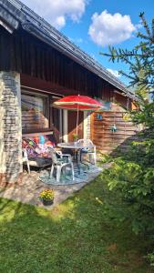 Vonkajšia záhrada v ubytovaní Sandras Ferienhaus Bungalow Sonnenalm
