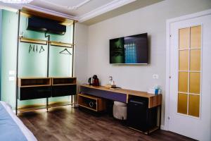 TV a/nebo společenská místnost v ubytování NS Luxury Suites