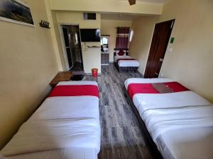 Letto o letti in una camera di Hotel Elite Pokhara