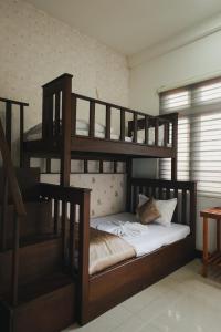Postel nebo postele na pokoji v ubytování Royal Retreat ,Kandy