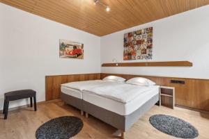 Postel nebo postele na pokoji v ubytování Hotel zum Erwin
