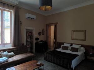 Postel nebo postele na pokoji v ubytování Appartement centre ville NIMES
