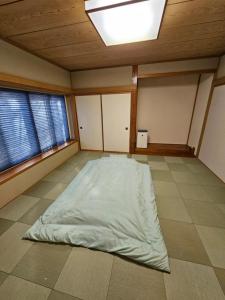 Katil atau katil-katil dalam bilik di The Deck Villa KitaKaruizawa +39 gambar