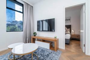 Et tv og/eller underholdning på Zeeland Pier Aparthotel by Totalstay + 153 billeder