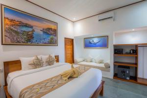 TV a/nebo společenská místnost v ubytování Ocean View Private Villa