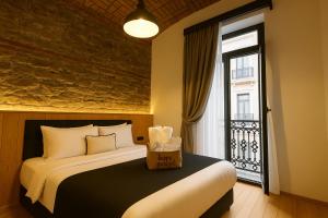 Postel nebo postele na pokoji v ubytování Istanbul Taksim Istiklal Street KAMIL Hotel - Historical