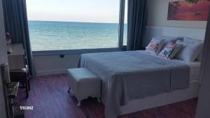Letto o letti in una camera di FOX Orbi Resort Hotel