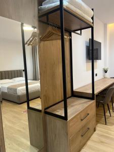Postel nebo postele na pokoji v ubytování Skanderbeg Hotel