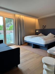 HOP Apartments & Suites客房内的一张或多张床位