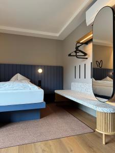 HOP Apartments & Suites客房内的一张或多张床位