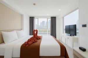 TV a/nebo společenská místnost v ubytování Shine Aparthotels Sukhumvit Thonglor