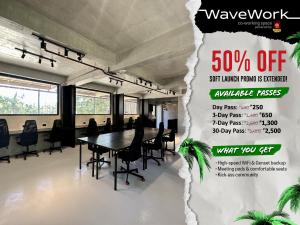 a poster of a meeting room with a table and chairs at Rucksack Inn Siargao in General Luna