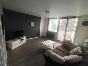 Μια τηλεόραση ή/και κέντρο ψυχαγωγίας στο L'appart de la tour T4