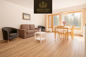 Posezení v ubytování Rehwiesa Studio C04 by Arosa Stay