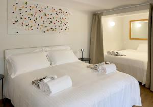Postel nebo postele na pokoji v ubytování Millefiori Apartment