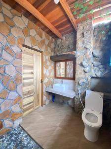 Postel nebo postele na pokoji v ubytování ADA Homestay