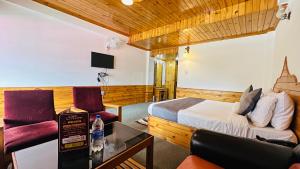 Predel za sedenje v nastanitvi Sita Hotel & Cottage, Manali - A Boutique Wellness Hotel