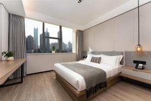 Легло или легла в стая в CM Serviced Apartment Shenzhen Dongmen