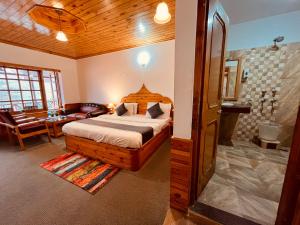 Postelja oz. postelje v sobi nastanitve Sita Hotel & Cottage, Manali - A Boutique Wellness Hotel