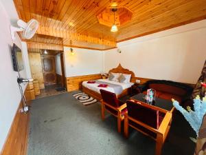 Predel za sedenje v nastanitvi Sita Hotel & Cottage, Manali - A Boutique Wellness Hotel