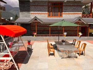 Veranda oz. zunanji predel v nastanitvi Sita Hotel & Cottage, Manali - A Boutique Wellness Hotel