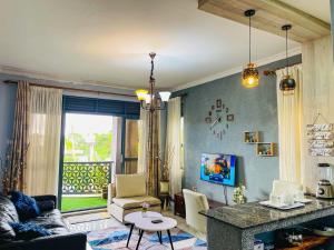 a living room with a couch and a table at 2 bedroom apartment Kigo in Kigo
