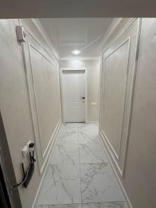 Φωτογραφία από το άλμπουμ του Уютные апартаменты на площади Аль-Фараби-SHYMKENT PLAZA σε Shymkent