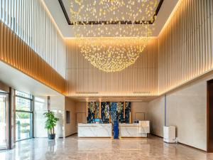 Posezení v ubytování Holiday Inn Express Kunshan Yushan by IHG