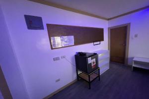 TV a/nebo společenská místnost v ubytování JM Lodge near Clark Airport + 11 fotografií