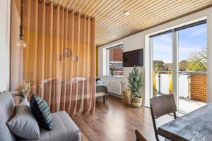 TV a/nebo společenská místnost v ubytování Hotel Ringkøbing