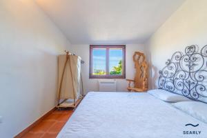 Postel nebo postele na pokoji v ubytování Residenza Di Paola e Francesco - By Searly