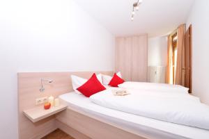 Posteľ alebo postele v izbe v ubytovaní Familienhotel Kleinwalsertal