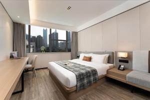Легло или легла в стая в CM Serviced Apartment Shenzhen Dongmen
