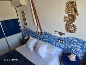 Postel nebo postele na pokoji v ubytování Hostal La Garita