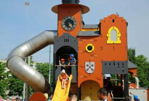 people on an inflatable slide on a playground at Baltic Design Apartments with free Parking and self check in in Riga