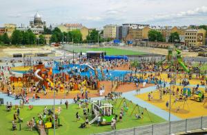 a large group of people at a playground at Baltic Design Apartments with free Parking and self check in in Riga +45 photos