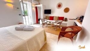 Postel nebo postele na pokoji v ubytování Le Dimore - Charme Rooms