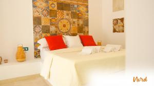 Postel nebo postele na pokoji v ubytování Le Dimore - Charme Rooms