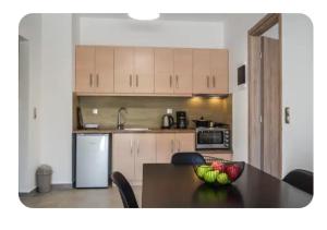 Afbeelding uit fotogalerij van Kamilos apartments in Monastirákion +7 foto's