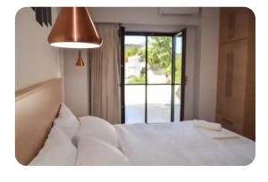 Afbeelding uit fotogalerij van Kamilos apartments in Monastirákion