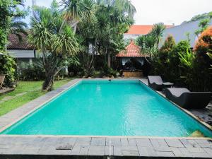 Bazén v ubytování Alita Hotel Sanur nebo v jeho okolí