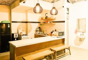 Kuchyň nebo kuchyňský kout v ubytování Alita Hotel Sanur