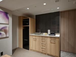 Kuchyň nebo kuchyňský kout v ubytování Premium Apart MONday GINZA EAST