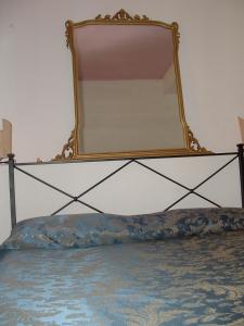 A bed or beds in a room at Agriturismo Pian dei Pini