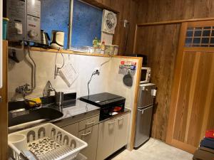 Køkken eller tekøkken på Fujitatami Guesthouse + 19 billeder