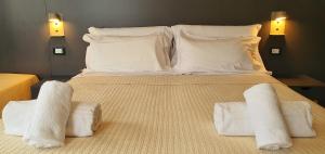 Postel nebo postele na pokoji v ubytování Bed & Bike Feltre