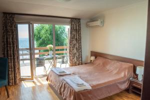 Postel nebo postele na pokoji v ubytování Shpinat + 32 fotografií