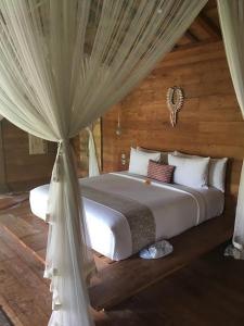 Postel nebo postele na pokoji v ubytování Aero homestay
